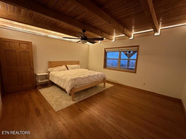 1015 Kizzy Patch Way, Del Rio, TN 37727 - bedroom with wood finished floors, wooden ceiling with exposed beams, and a ceiling fan