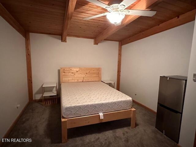 1015 Kizzy Patch Way, Del Rio, TN 37727 - carpeted bedroom with wooden ceiling with exposed beams, a ceiling fan, and baseboards