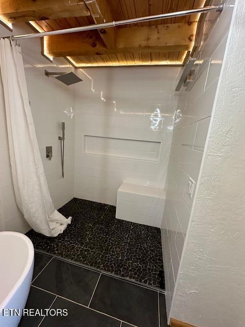 1015 Kizzy Patch Way, Del Rio, TN 37727 - bathroom with a stall shower and tile patterned flooring