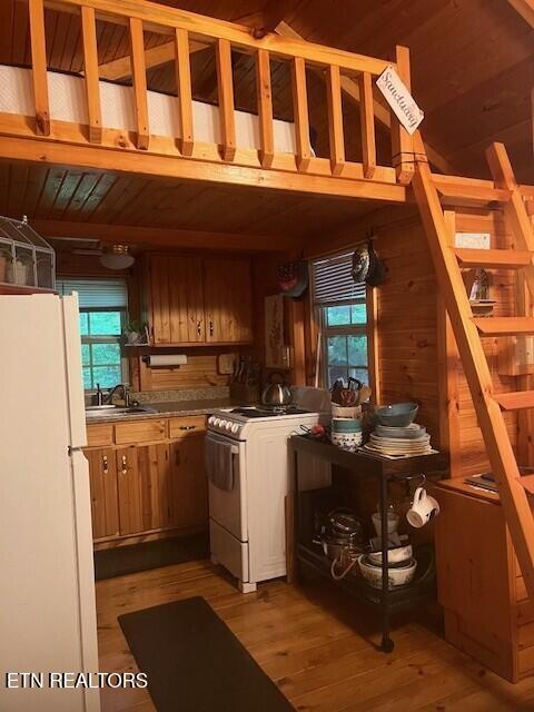 533 Valley Ridge Rd, Jamestown, TN 38556 - kitchen featuring white appliances, plenty of natural light, a sink, light wood-style flooring, and wood ceiling