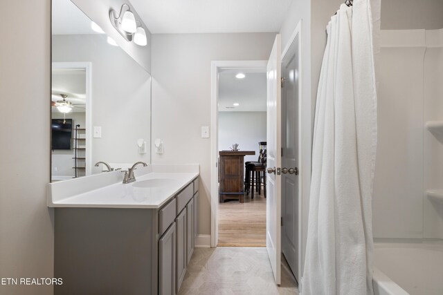 8104 Equinox Ln, Powell, TN 37849 - bathroom with vanity, a ceiling fan, shower / bath combo with shower curtain, and recessed lighting