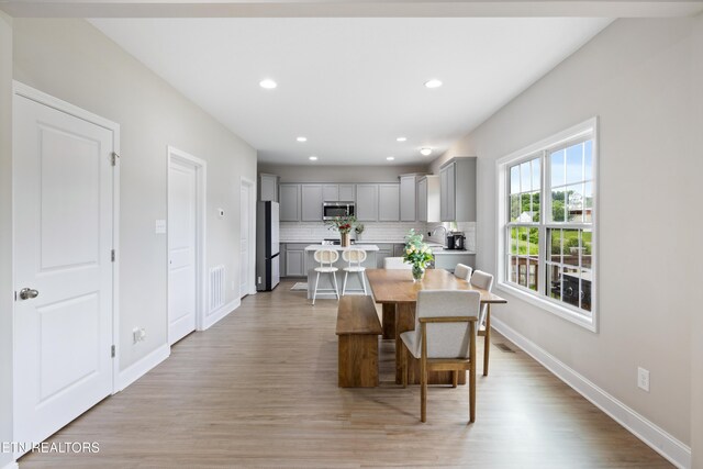 8104 Equinox Ln, Powell, TN 37849 - dining room with light wood-style flooring, baseboards, and recessed lighting