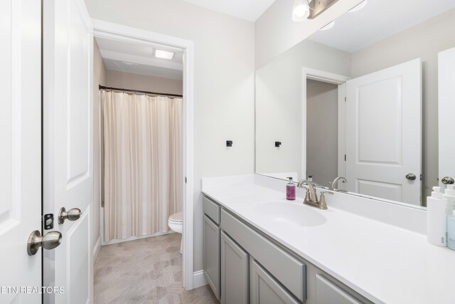 8104 Equinox Ln, Powell, TN 37849 - bathroom with vanity, toilet, and curtained shower