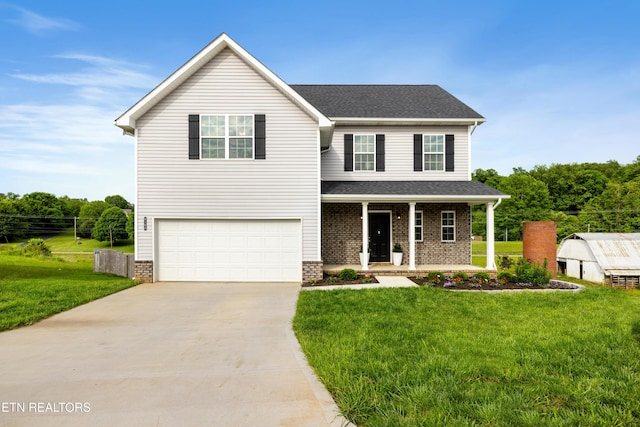 8104 Equinox Ln, Powell, TN 37849 - view of front facade with driveway, an attached garage, covered porch, a front yard, and a shingled roof