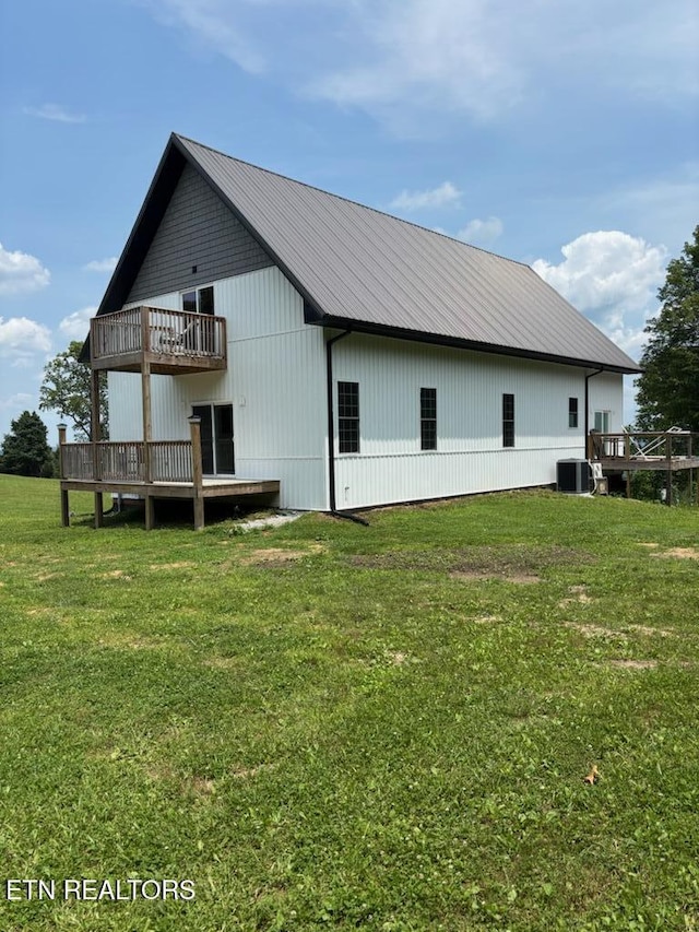 264 Victory Cross Rd, Lafollette, TN 37766 - view of home's exterior featuring a yard, a wooden deck, and a metal roof