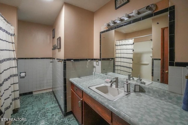 2001 Highland Rd, Maryville, TN 37801 - bathroom featuring tile walls, vanity, a wainscoted wall, and curtained shower