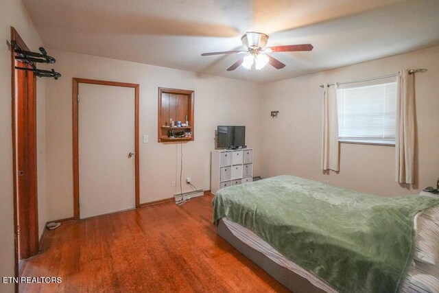 2001 Highland Rd, Maryville, TN 37801 - bedroom with wood finished floors, baseboards, and ceiling fan