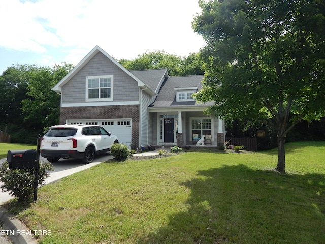 9100 Sway Branch Ln, Knoxville, TN 37922 - craftsman-style home with a garage, a front lawn, driveway, brick siding, and a porch