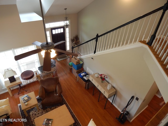 9100 Sway Branch Ln, Knoxville, TN 37922 - entryway with a high ceiling, wood finished floors, stairway, and a chandelier