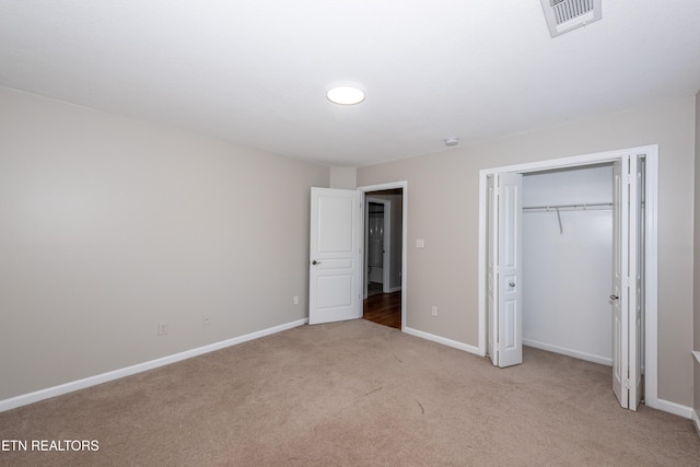 9100 Sway Branch Ln, Knoxville, TN 37922 - unfurnished bedroom with light carpet and a closet