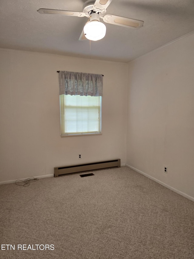 114 Verdun Rd, Oneida, TN 37841 - carpeted spare room featuring a baseboard radiator, ceiling fan, and baseboards
