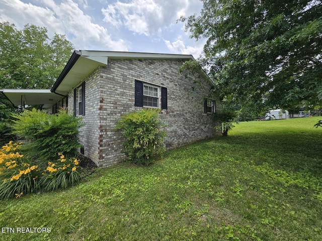 114 Verdun Rd, Oneida, TN 37841 - view of side of home with a yard, crawl space, and brick siding