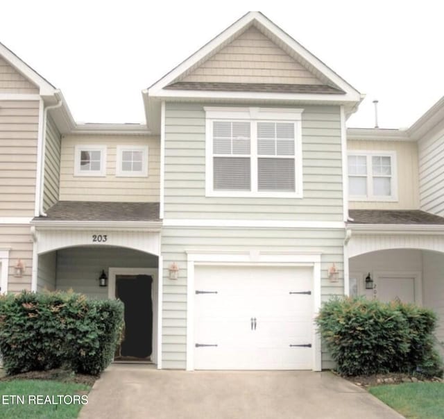 203 Bar Tall Way, Seymour, TN 37865 - view of front of home with a garage, concrete driveway, and a shingled roof
