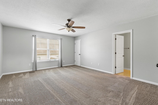 203 Bar Tall Way, Seymour, TN 37865 - spare room featuring ceiling fan, carpet flooring, and a textured ceiling