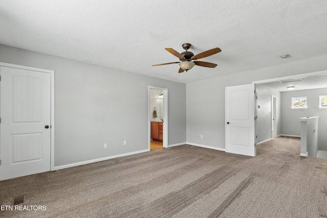 203 Bar Tall Way, Seymour, TN 37865 - unfurnished bedroom featuring carpet, a textured ceiling, ensuite bathroom, and a ceiling fan