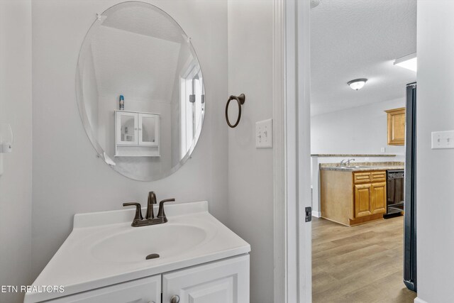 203 Bar Tall Way, Seymour, TN 37865 - bathroom with vanity and wood finished floors
