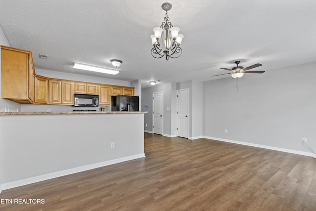 203 Bar Tall Way, Seymour, TN 37865 - kitchen with black appliances, dark wood-style flooring, ceiling fan, a chandelier, and decorative light fixtures