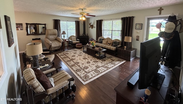 2726 Kentwood Dr, Kodak, TN 37764 - living room featuring a textured ceiling, a ceiling fan, wood finished floors, and baseboards