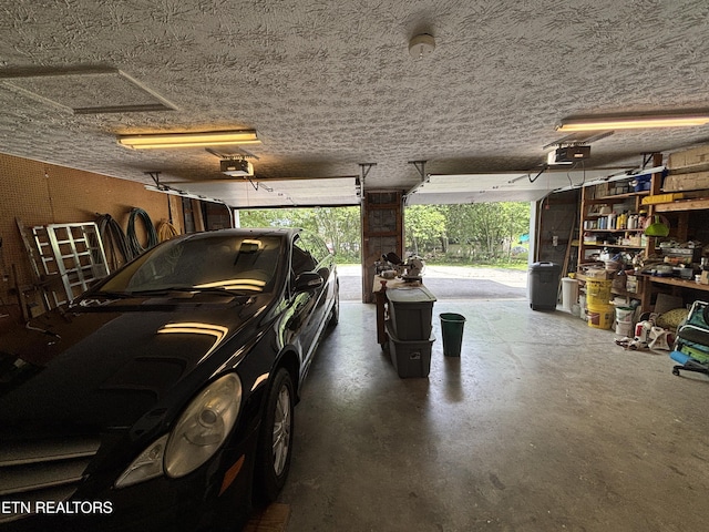 2726 Kentwood Dr, Kodak, TN 37764 - garage featuring a garage door opener