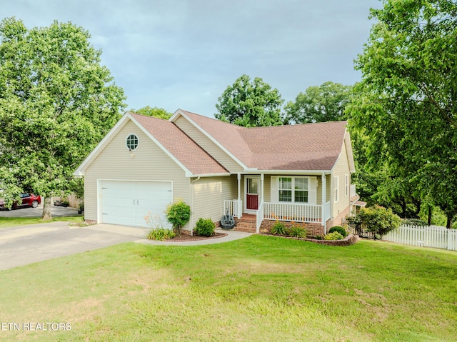 116 Deer Path Trl, Vonore, TN 37885 - view of front facade featuring a porch, driveway, roof with shingles, and a garage