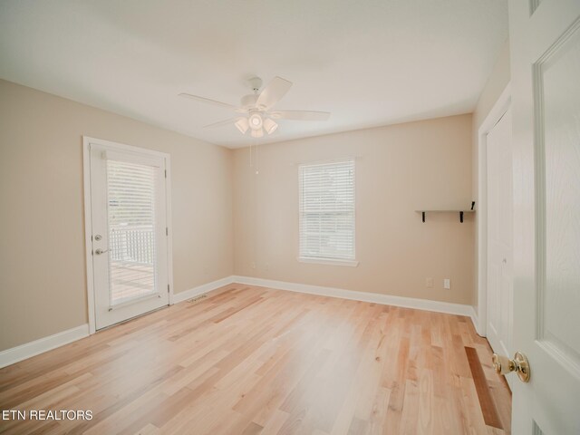 116 Deer Path Trl, Vonore, TN 37885 - spare room with light wood finished floors, a ceiling fan, and baseboards