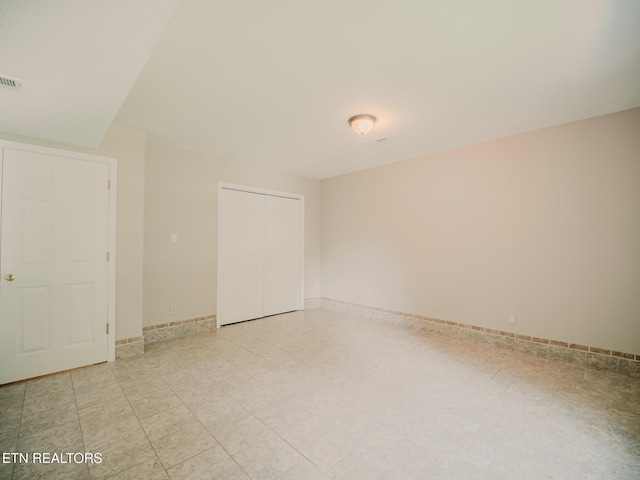 116 Deer Path Trl, Vonore, TN 37885 - unfurnished bedroom featuring a closet and baseboards