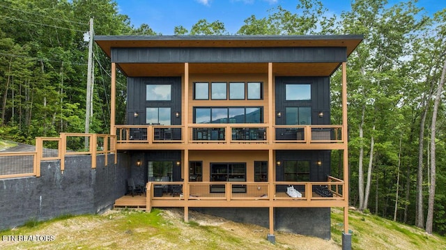 2634 Whipoorwill Hill Way, Sevierville, TN 37862 - back of house with a balcony and board and batten siding