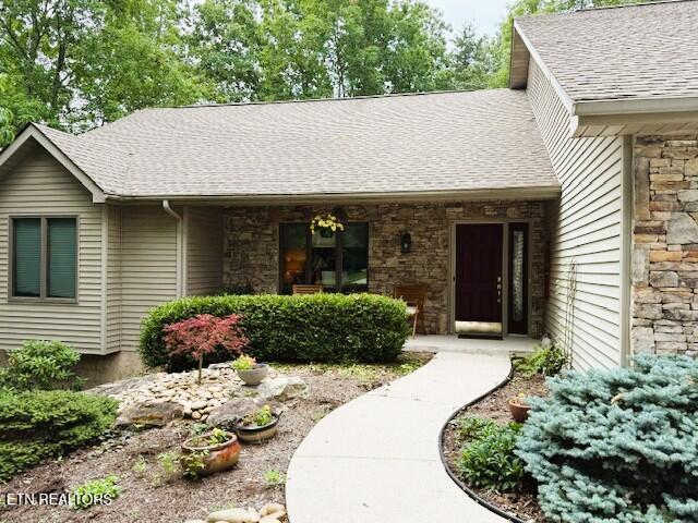 128 Cathedral Dr, Crossville, TN 38558 - property entrance with a shingled roof