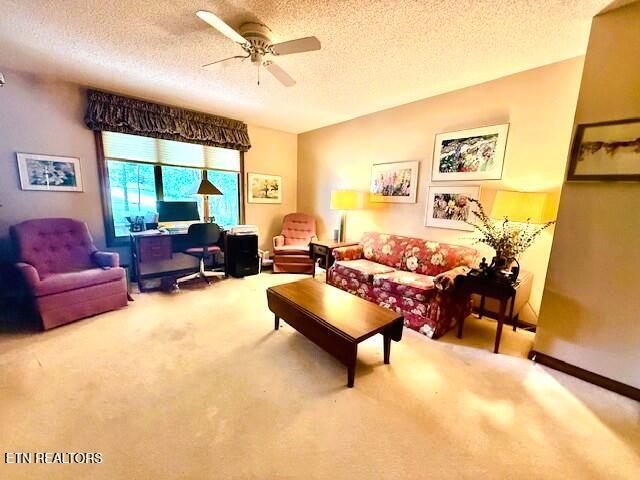 128 Cathedral Dr, Crossville, TN 38558 - carpeted living area featuring a textured ceiling, an office area, and ceiling fan