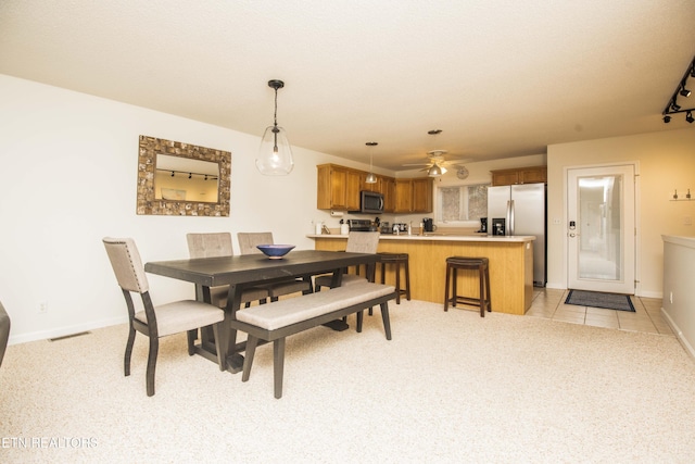 245 Doe Ln Unit 5, Lafollette, TN 37766 - dining room featuring light colored carpet, baseboards, a ceiling fan, and light tile patterned floors
