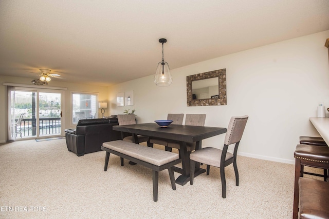 245 Doe Ln Unit 5, Lafollette, TN 37766 - dining area featuring light carpet, a ceiling fan, and baseboards