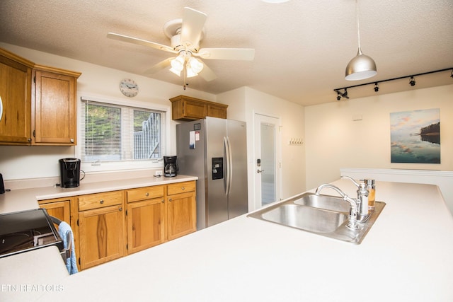 245 Doe Ln Unit 5, Lafollette, TN 37766 - kitchen featuring stainless steel refrigerator with ice dispenser, a sink, a ceiling fan, light countertops, and a textured ceiling