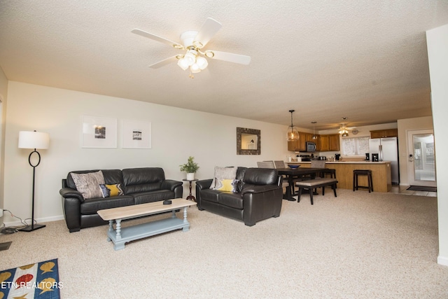 245 Doe Ln Unit 5, Lafollette, TN 37766 - living room featuring ceiling fan, light carpet, and a textured ceiling