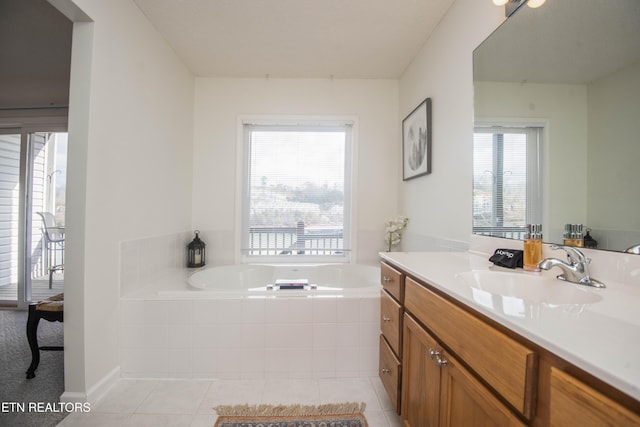 245 Doe Ln Unit 5, Lafollette, TN 37766 - bathroom with vanity, a bath, and tile patterned floors