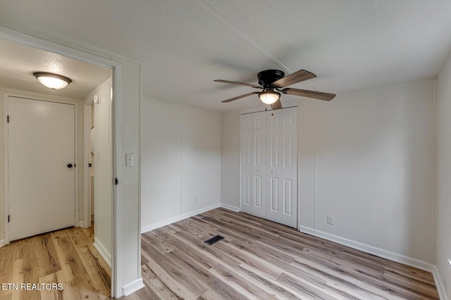135 Mt View Rd, Sweetwater, TN 37874 - empty room with light wood-type flooring, a ceiling fan, and a textured ceiling