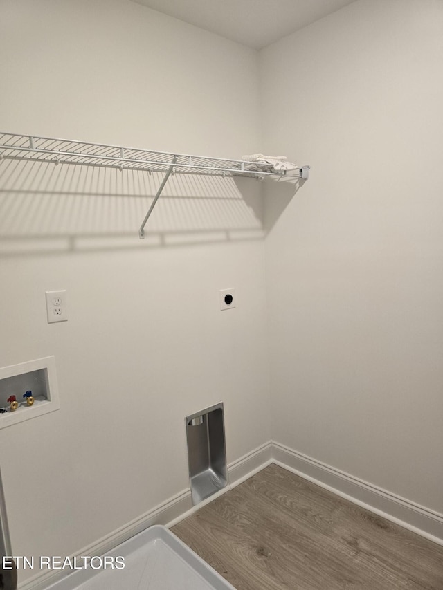 1334 Mountain Quail Cir, Maryville, TN 37801 - washroom with dark wood finished floors, washer hookup, and electric dryer hookup