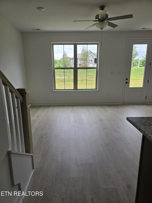1334 Mountain Quail Cir, Maryville, TN 37801 - unfurnished living room with ceiling fan and wood finished floors