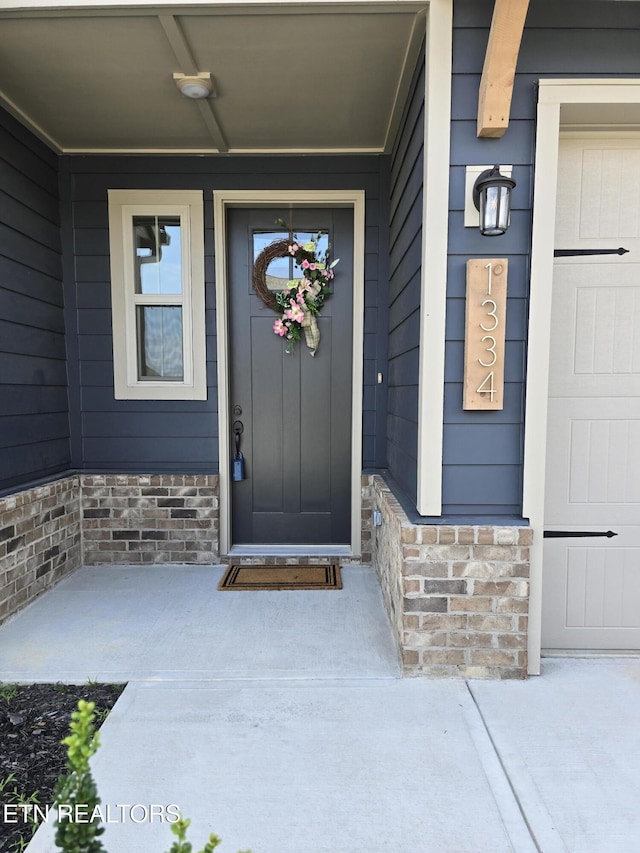 1334 Mountain Quail Cir, Maryville, TN 37801 - entrance to property featuring a porch and stone siding