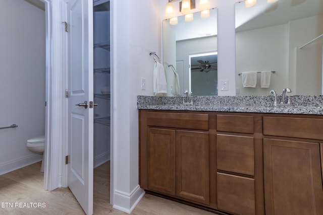 1334 Mountain Quail Cir, Maryville, TN 37801 - full bath with double vanity, ceiling fan, and wood finished floors