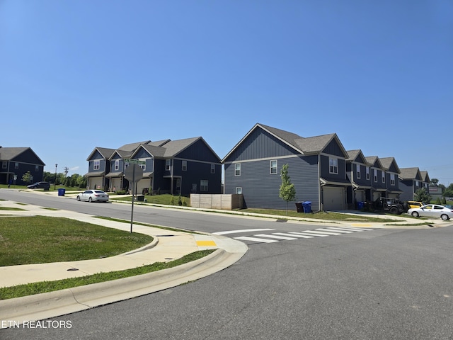 1334 Mountain Quail Cir, Maryville, TN 37801 - view of asphalt street with a residential view, sidewalks, and curbs