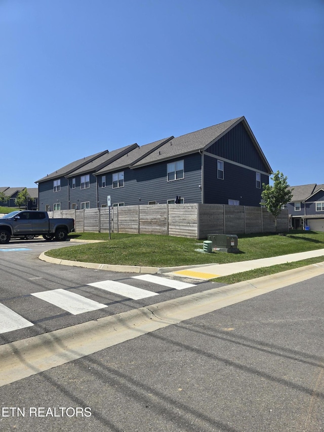 1334 Mountain Quail Cir, Maryville, TN 37801 - view of property exterior with board and batten siding and a residential view