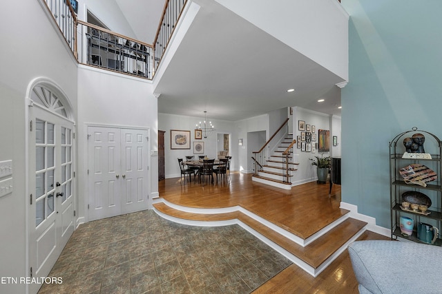 8940 Kelsey Ln, Knoxville, TN 37922 - foyer entrance featuring stairway, a chandelier, a towering ceiling, and recessed lighting