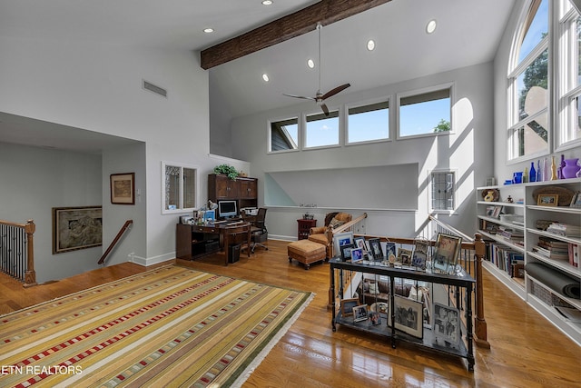 8940 Kelsey Ln, Knoxville, TN 37922 - living area with high vaulted ceiling, a ceiling fan, beam ceiling, wood finished floors, and recessed lighting