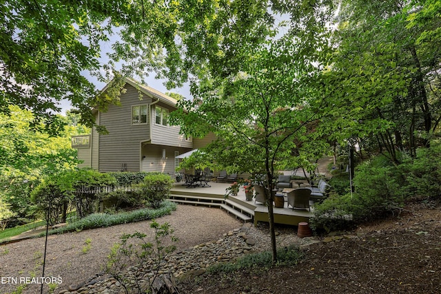8940 Kelsey Ln, Knoxville, TN 37922 - rear view of property featuring a wooden deck and outdoor dining space