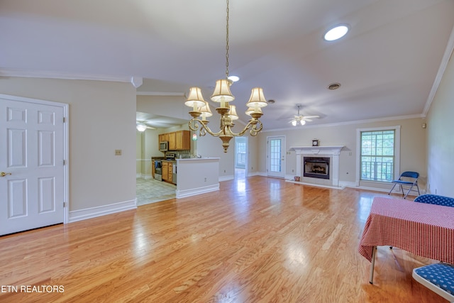 674 Applegate Ln Unit 32, Knoxville, TN 37934 - unfurnished living room with a chandelier, a high end fireplace, ornamental molding, plenty of natural light, and baseboards