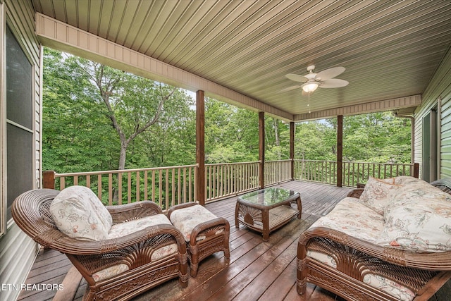 15 Chatham Ct, Fairfield Glade, TN 38558 - deck featuring ceiling fan, an outdoor hangout area, and view of scattered trees