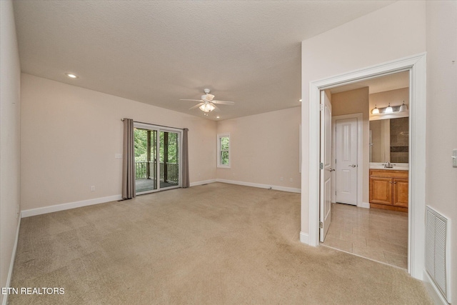 15 Chatham Ct, Fairfield Glade, TN 38558 - unfurnished room featuring light carpet, a ceiling fan, recessed lighting, and a textured ceiling