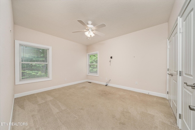 15 Chatham Ct, Fairfield Glade, TN 38558 - unfurnished room featuring light colored carpet and ceiling fan