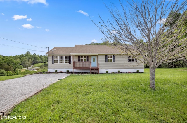 165 Kenzie Ln, Lafollette, TN 37766 - ranch-style home with a front lawn and gravel driveway