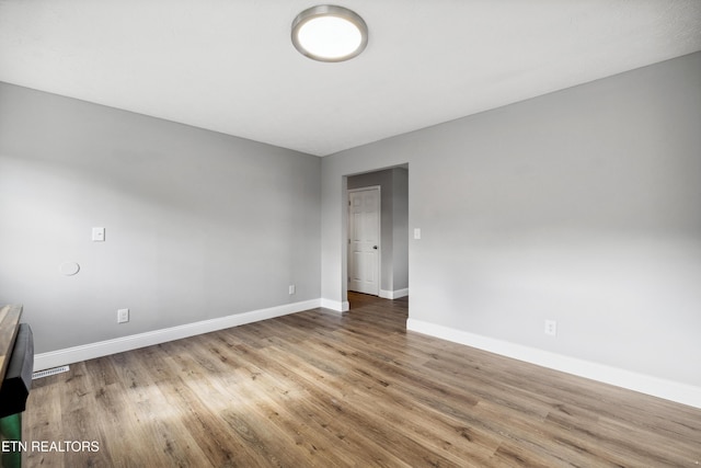 165 Kenzie Ln, Lafollette, TN 37766 - unfurnished room featuring baseboards and wood finished floors